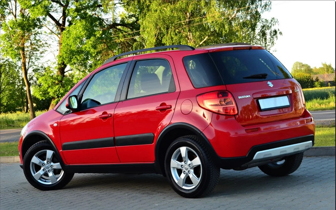 Suzuki SX4 cena 31900 przebieg: 93865, rok produkcji 2013 z Piastów małe 562